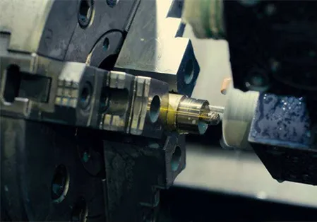 Live PLAM CNC turning operation on a precision metal workpiece